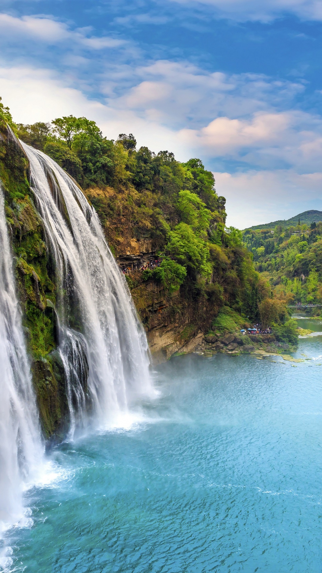 Waterfalls on Green Grass Covered Mountain During Daytime. Wallpaper in 1080x1920 Resolution