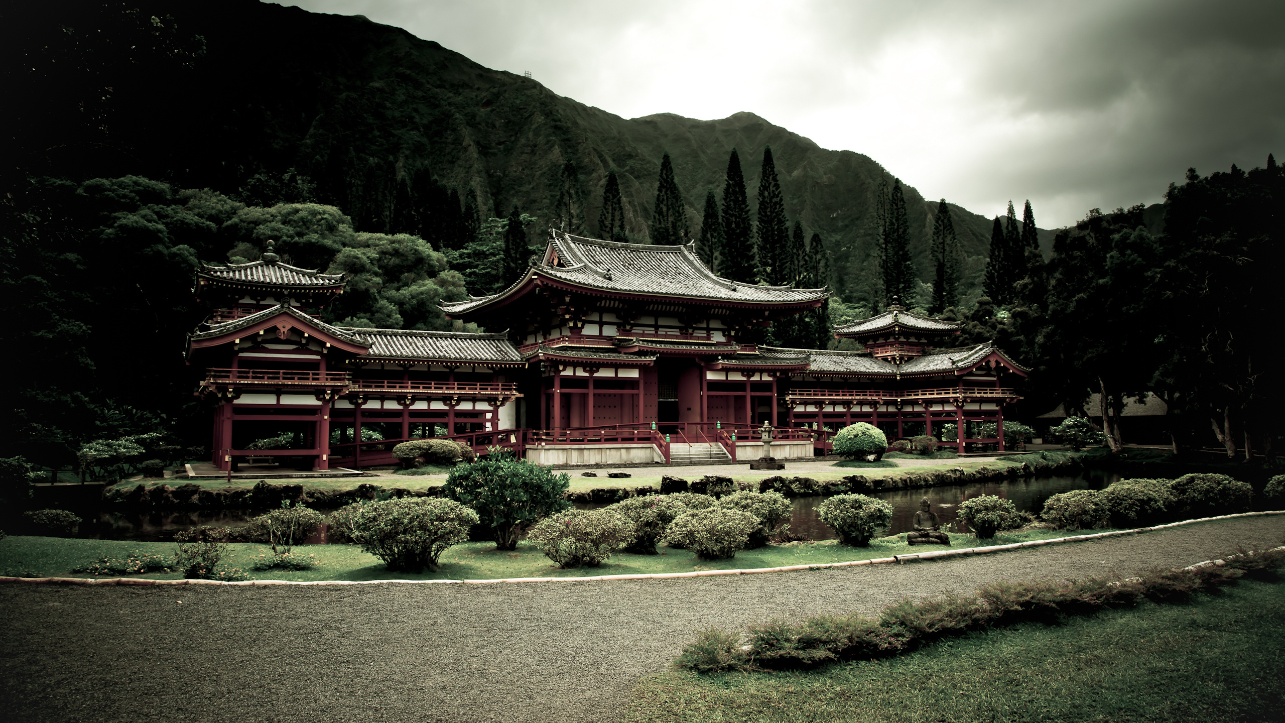 Red and White Temple Near Green Trees and Mountain During Daytime. Wallpaper in 2560x1440 Resolution