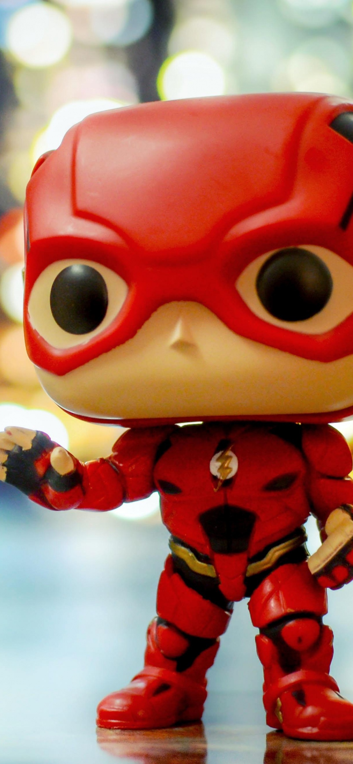 Estatuilla Roja m Ms. Wallpaper in 1125x2436 Resolution