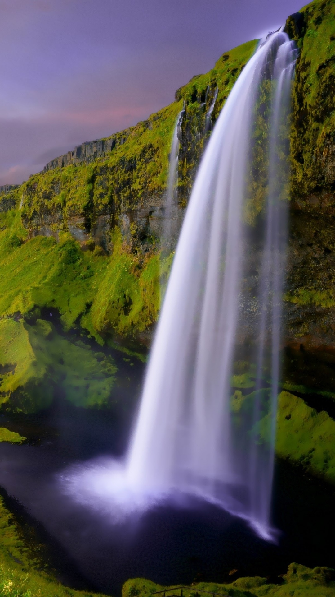 Green Grass Field Near Waterfalls During Daytime. Wallpaper in 1080x1920 Resolution