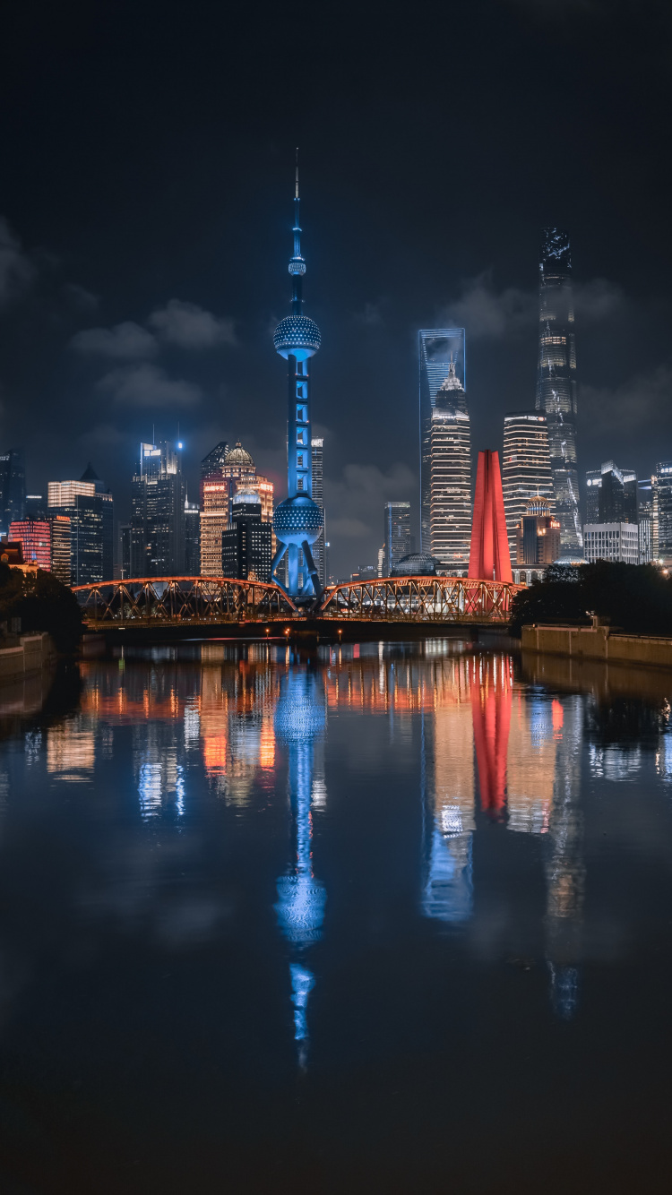 Horizon de la Ville Pendant la Nuit. Wallpaper in 750x1334 Resolution