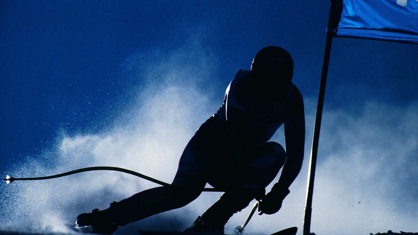 Silhouette of Man Riding Ski Lames Sous Ciel Bleu. Wallpaper in 1366x768 Resolution