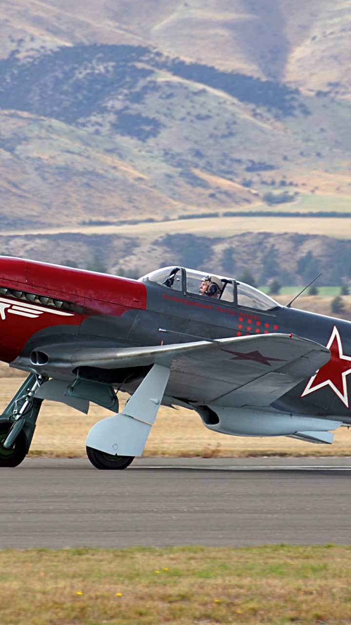 Red and White Jet Plane on Gray Concrete Road During Daytime. Wallpaper in 720x1280 Resolution