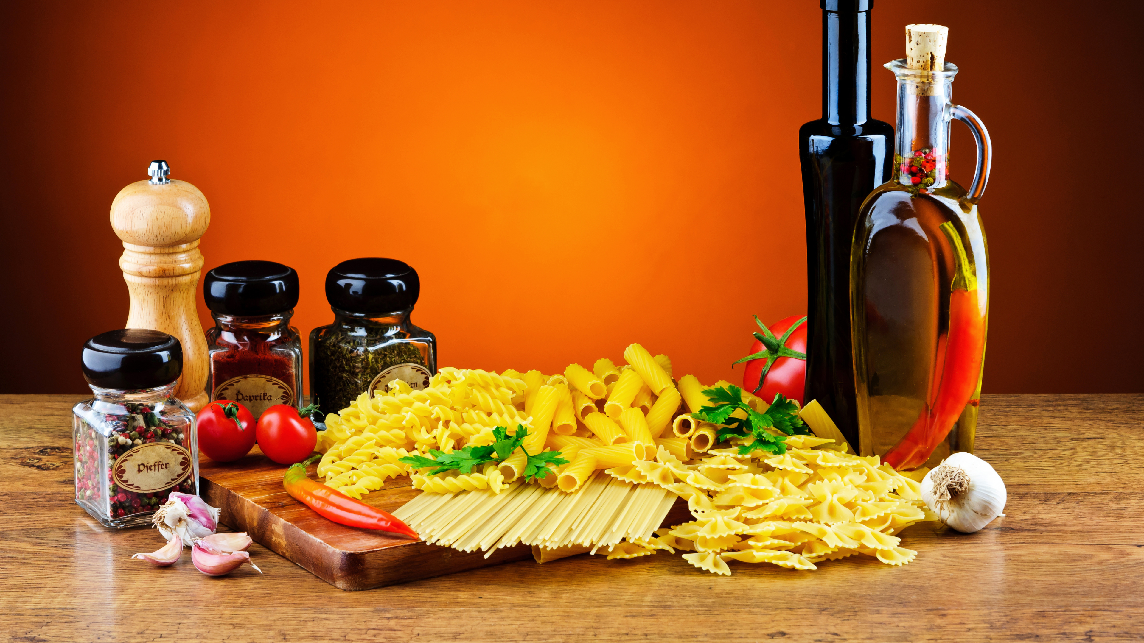 Fries on Brown Wooden Chopping Board Beside Condiment Shakers. Wallpaper in 3840x2160 Resolution