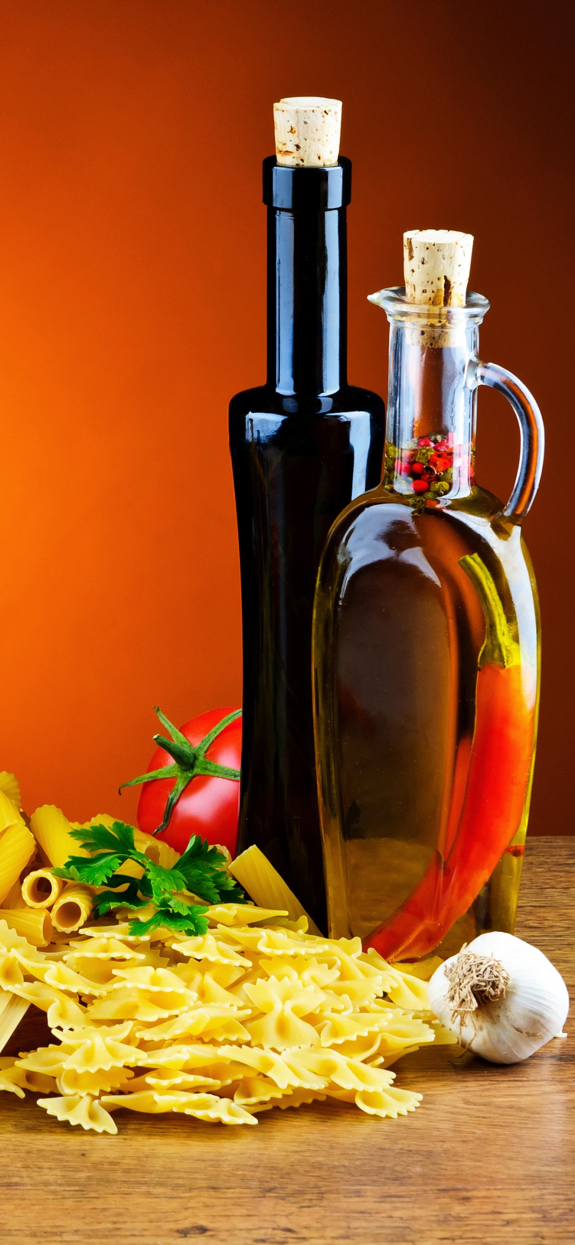 Papas Fritas en Una Tabla de Cortar de Madera Marrón Junto a Los Agitadores de Condimentos. Wallpaper in 1125x2436 Resolution