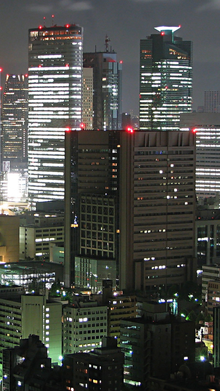 High Rise Buildings During Night Time. Wallpaper in 750x1334 Resolution