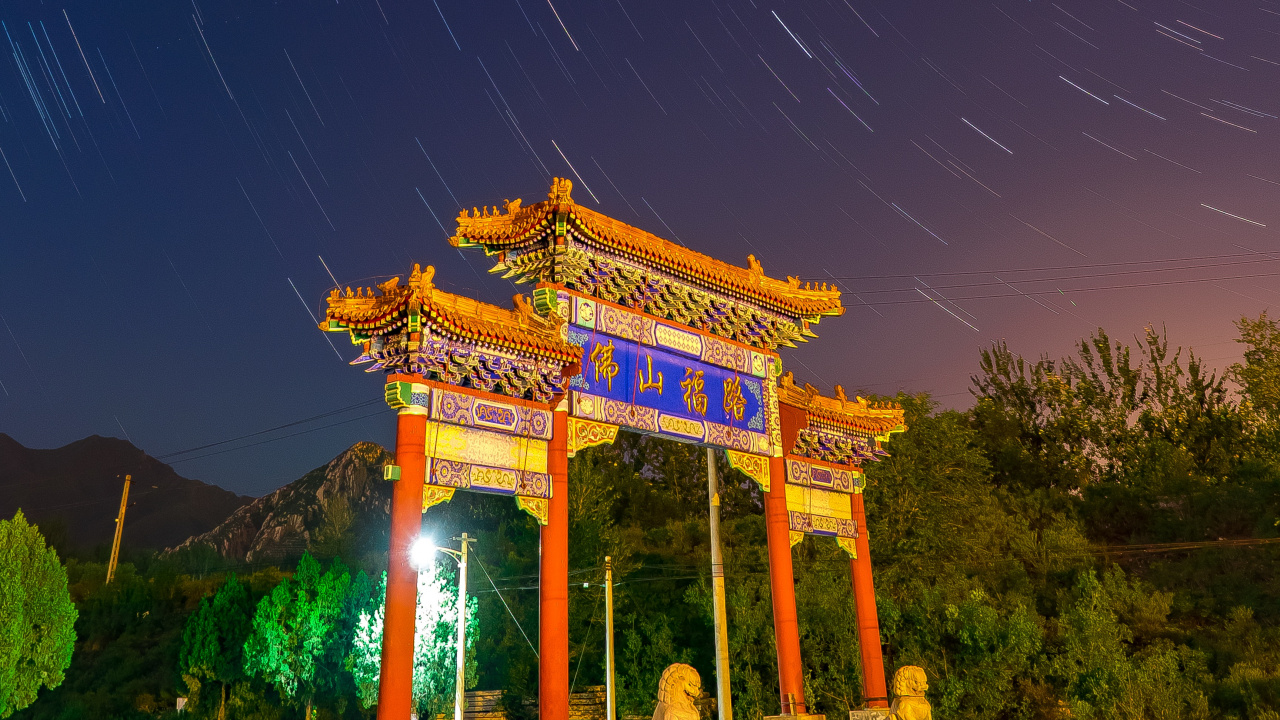 Brown Temple Under Blue Sky During Night Time. Wallpaper in 1280x720 Resolution