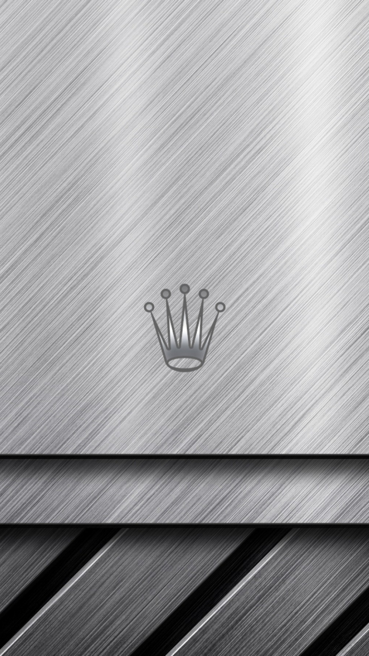 Macbook Plateado Sobre Textiles a Rayas en Blanco y Negro. Wallpaper in 750x1334 Resolution