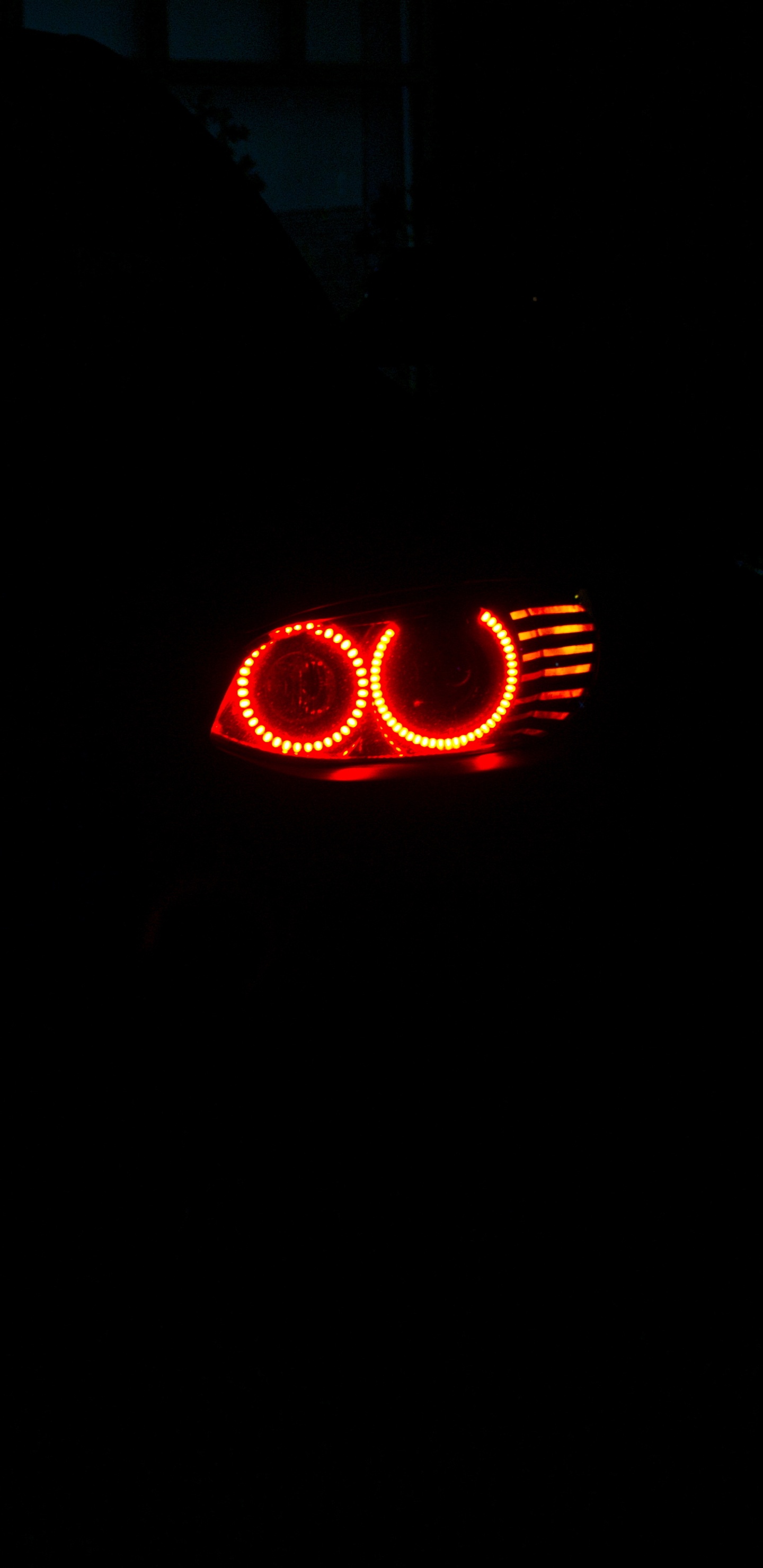 Red and Black Lighted Device. Wallpaper in 1440x2960 Resolution