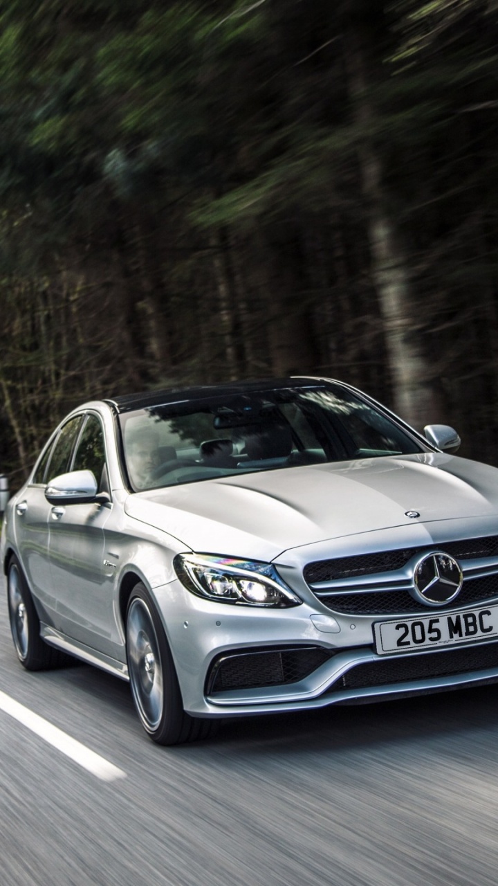 Mercedes Benz Coupé Noir Sur Route Pendant la Journée. Wallpaper in 720x1280 Resolution