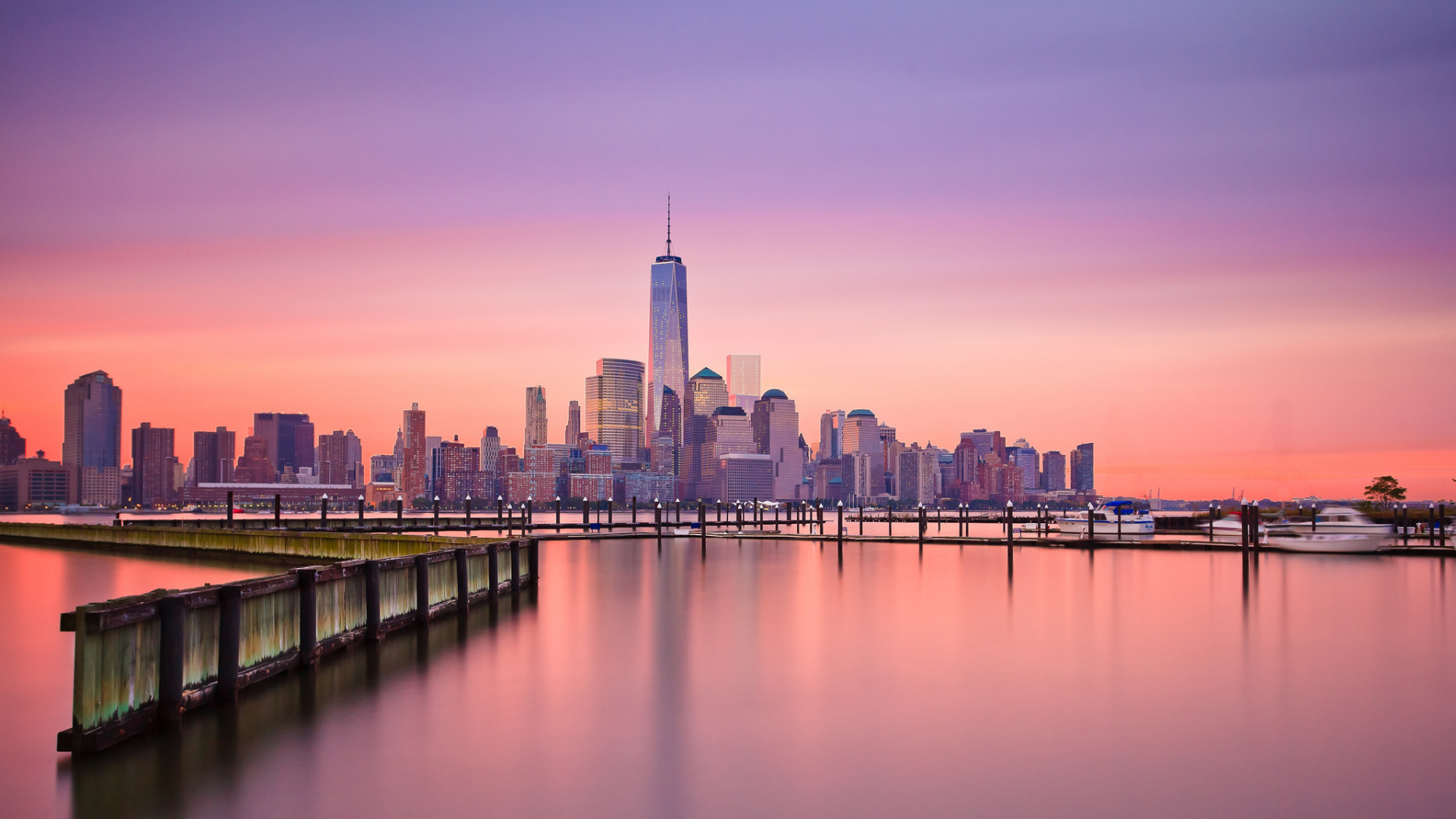 City Skyline Across Body of Water During Daytime. Wallpaper in 1920x1080 Resolution