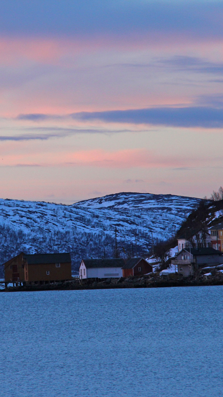 Houses Near Snow Covered Mountain During Daytime. Wallpaper in 750x1334 Resolution