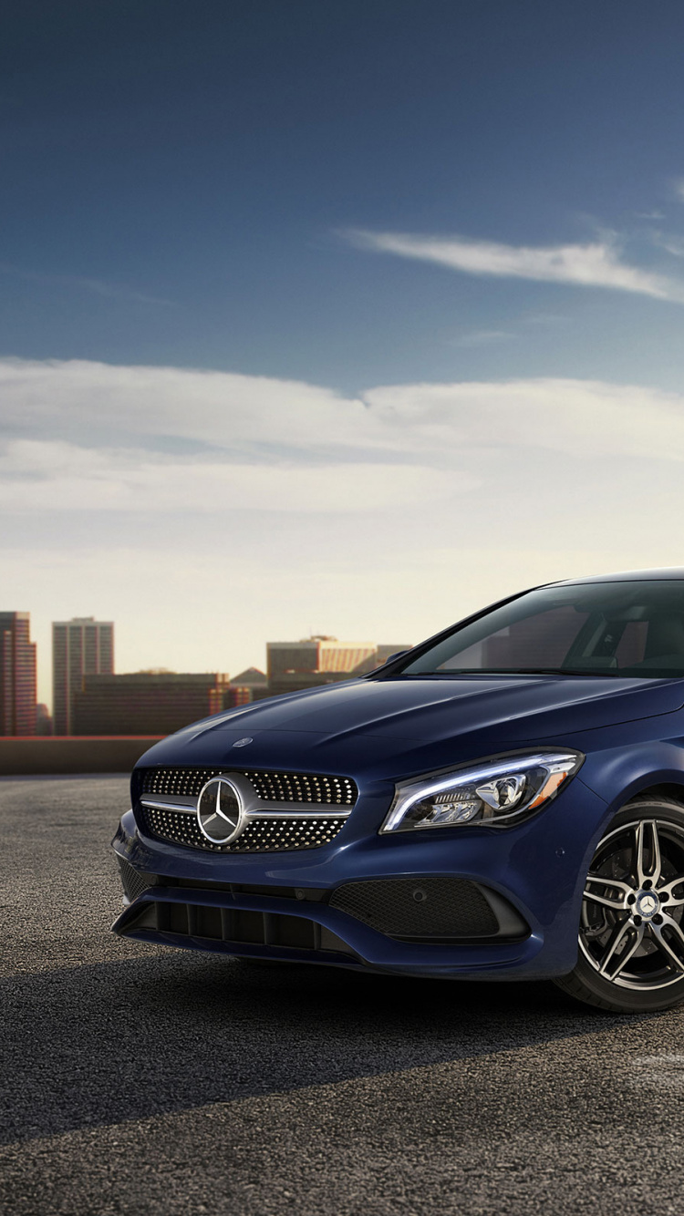 Blue Bmw m 3 Coupe on Brown Sand During Daytime. Wallpaper in 750x1334 Resolution