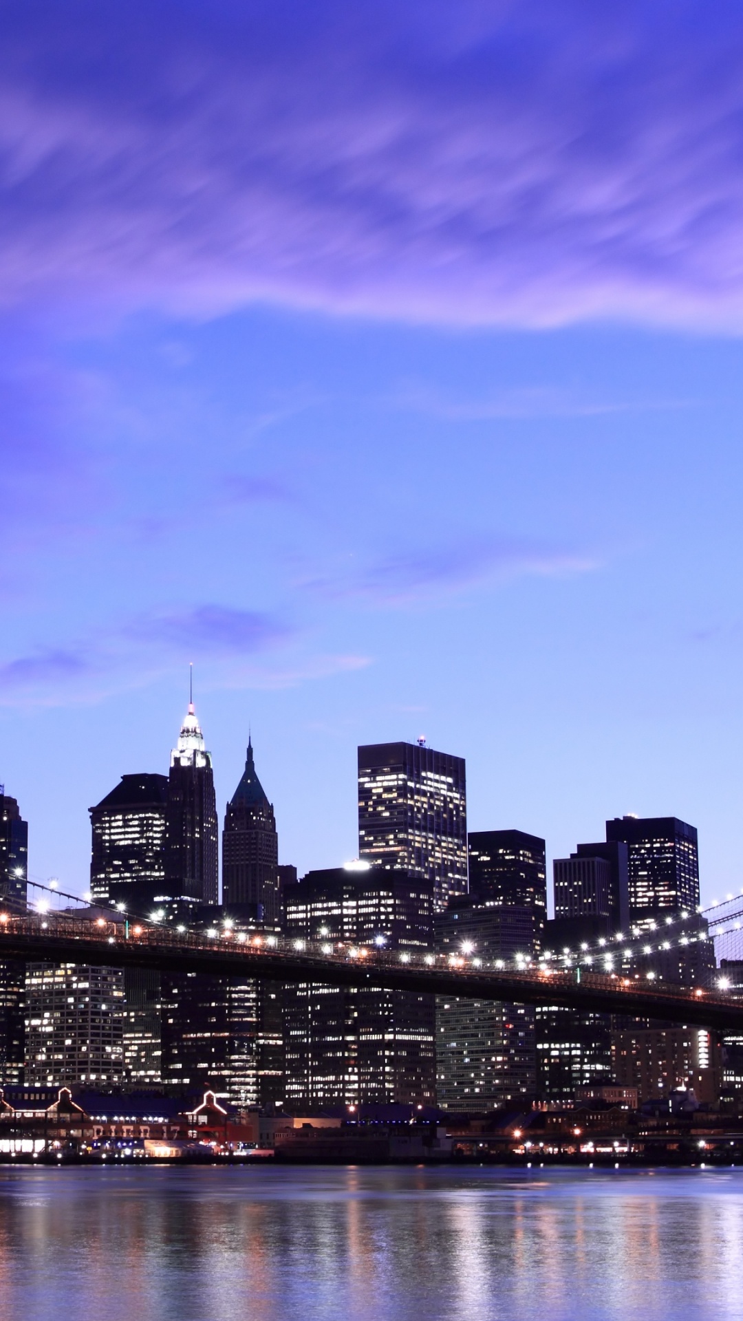 City Skyline Across Body of Water During Night Time. Wallpaper in 1080x1920 Resolution