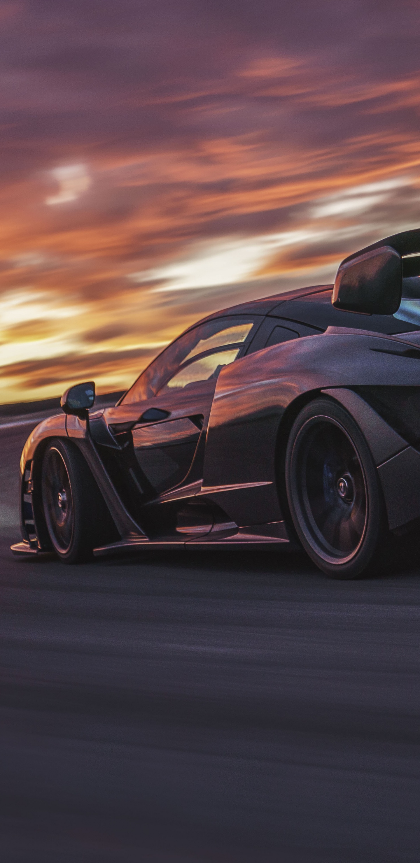 Schwarzer Porsche 911 Unterwegs Bei Sonnenuntergang. Wallpaper in 1440x2960 Resolution