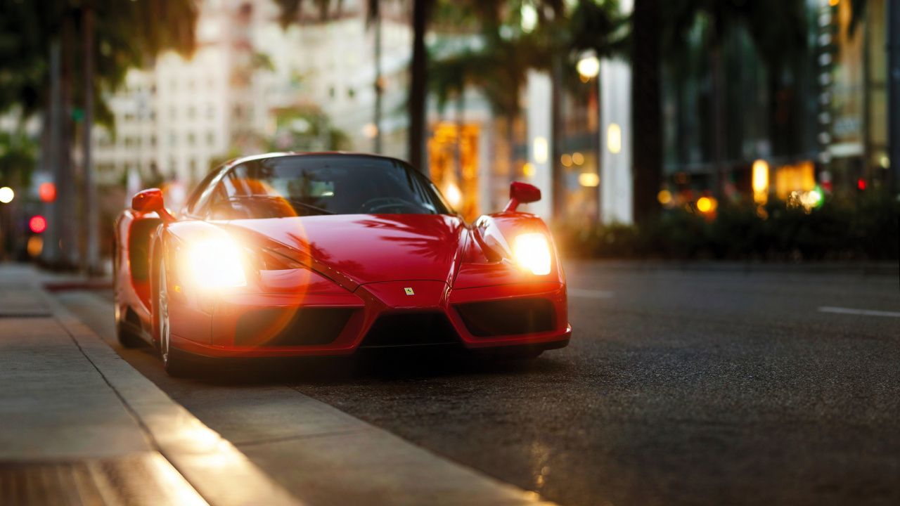 Red Ferrari Sports Car on Road During Daytime. Wallpaper in 1280x720 Resolution