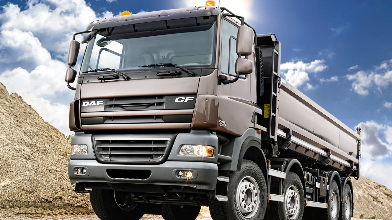 Brown and Gray Truck on Brown Field Under Blue and White Sunny Cloudy Sky During Daytime. Wallpaper in 1280x720 Resolution