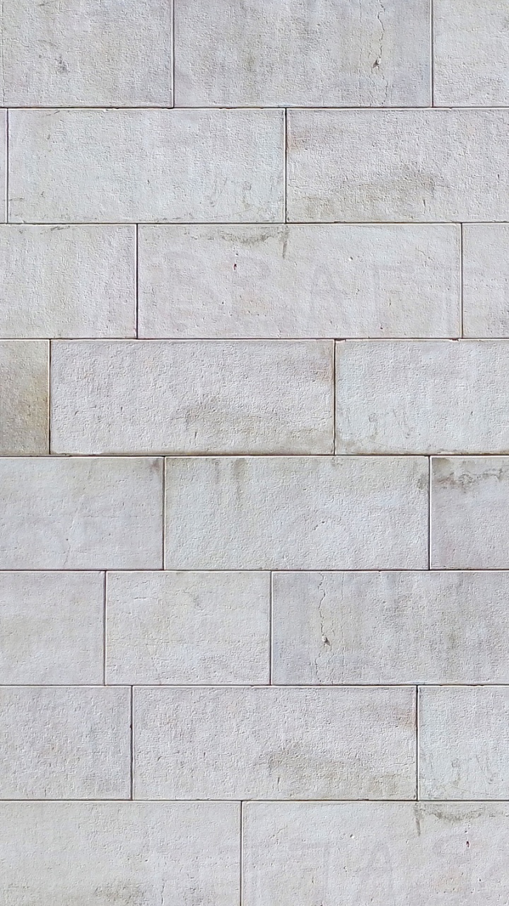 Muro de Hormigón Blanco Durante el Día.. Wallpaper in 720x1280 Resolution