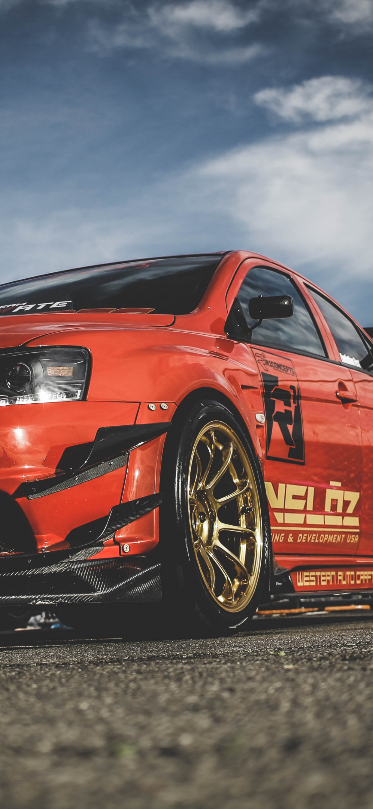 Red Audi r 8 on Road During Daytime. Wallpaper in 1242x2688 Resolution