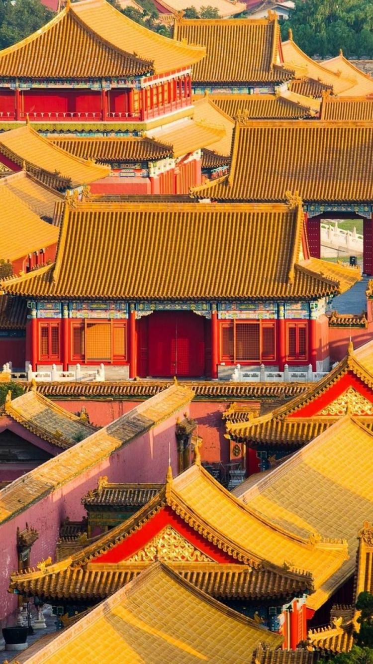 Casas de Hormigón Marrón y Blanco Durante el Día.. Wallpaper in 750x1334 Resolution