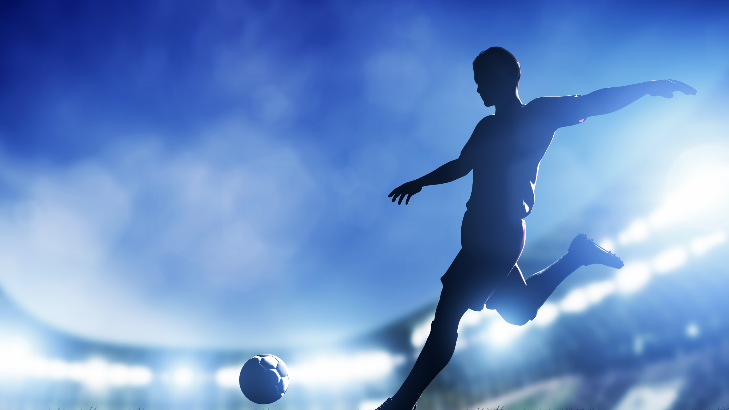 Man in Black Shorts Playing Soccer Ball. Wallpaper in 2560x1440 Resolution