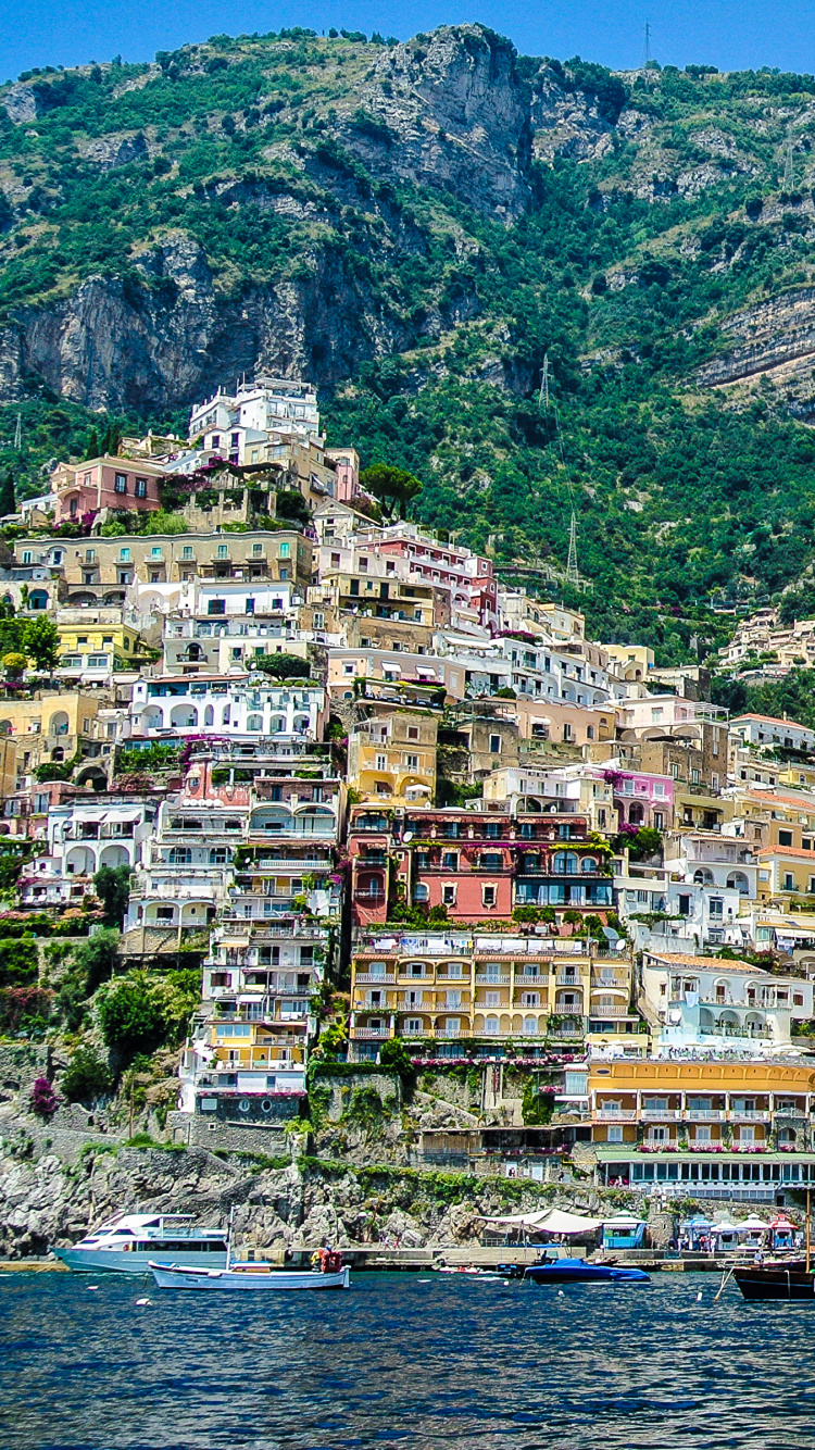 Houses on Mountain Beside Body of Water During Daytime. Wallpaper in 750x1334 Resolution