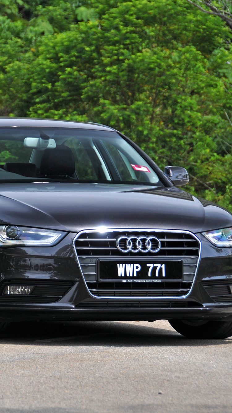 Black Audi a 4 on Road During Daytime. Wallpaper in 750x1334 Resolution