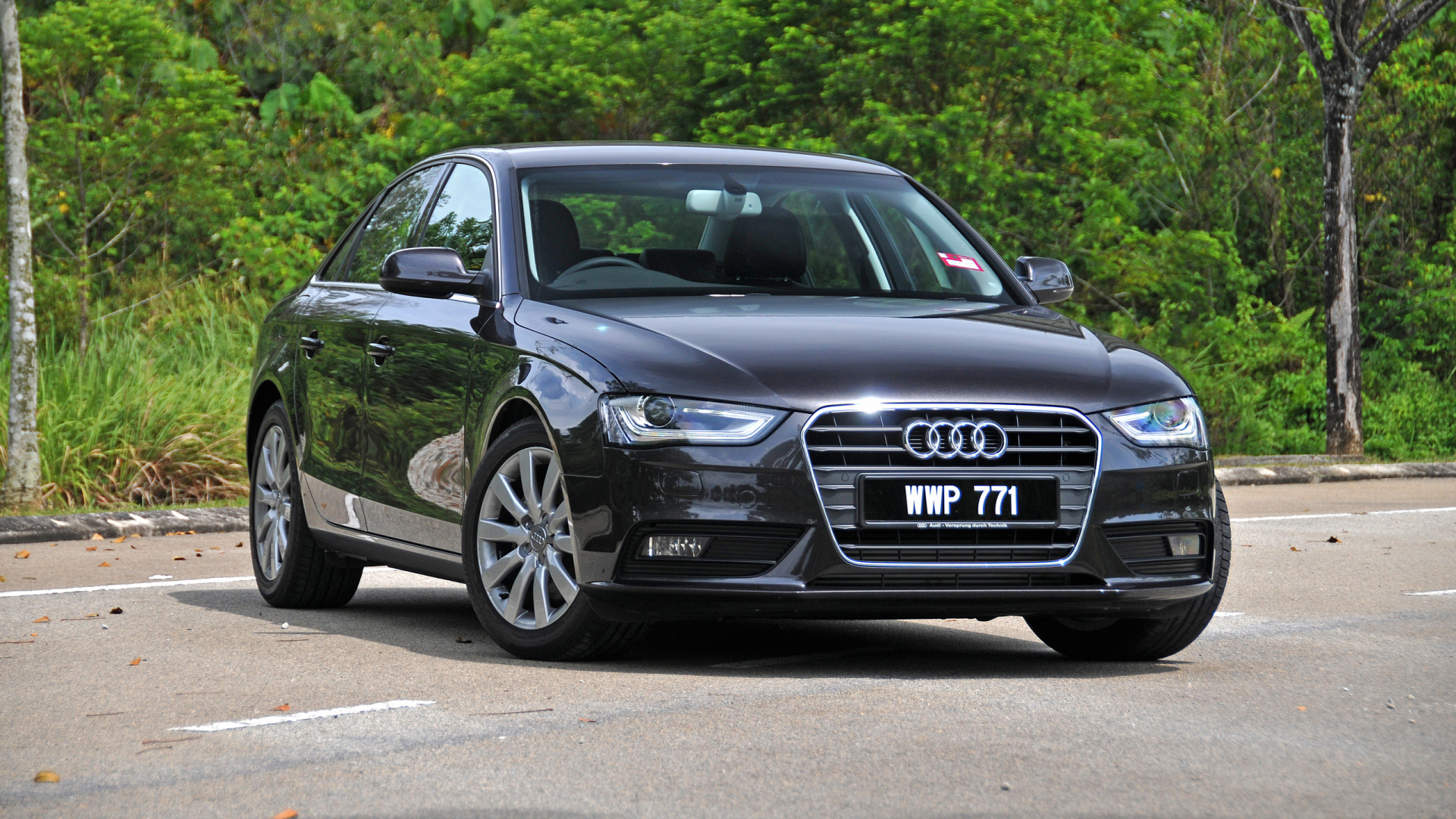 Audi Noir a 4 Sur Route Pendant la Journée. Wallpaper in 1920x1080 Resolution