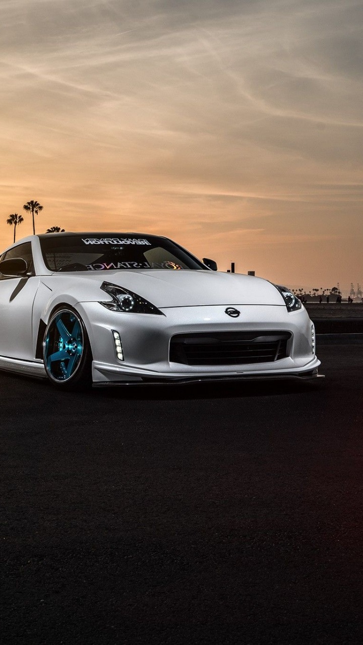 White Porsche 911 on Road During Sunset. Wallpaper in 720x1280 Resolution