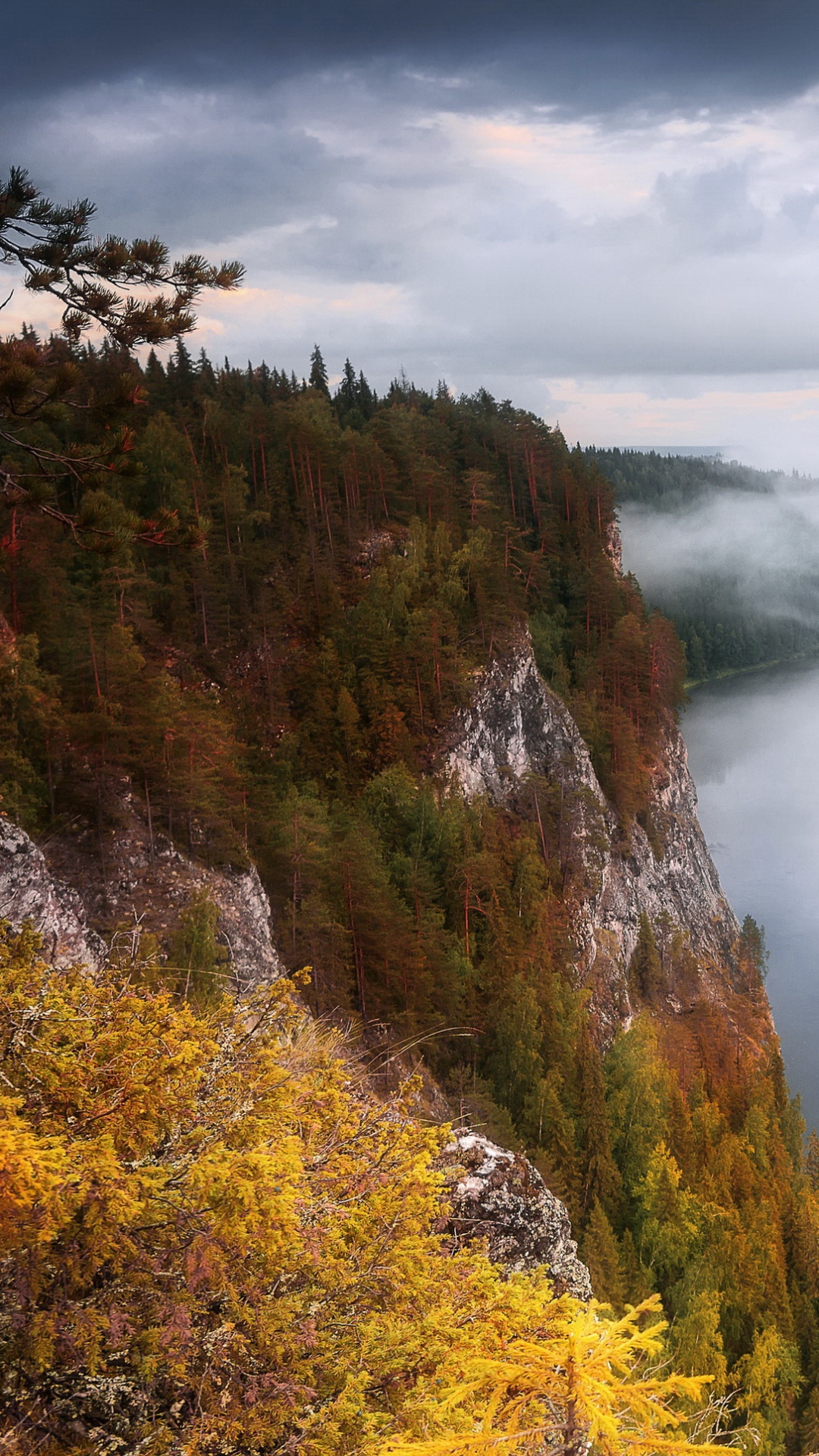 Green and Brown Mountain Beside River Under Cloudy Sky During Daytime. Wallpaper in 1080x1920 Resolution