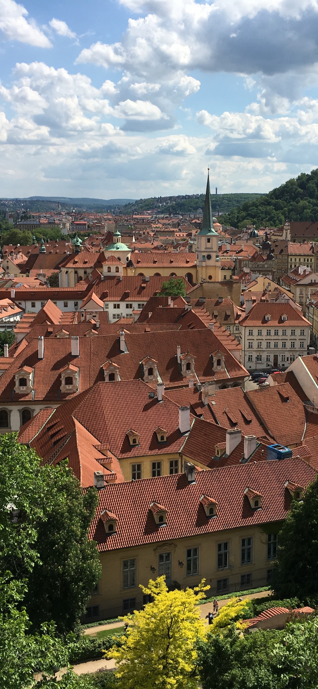 Brown Concrete Houses Under Blue Sky During Daytime. Wallpaper in 1242x2688 Resolution