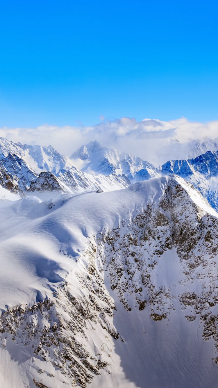 Schweizer Alpen, Titlis, Matterhorn, Mount Fuji, Winter. Wallpaper in 750x1334 Resolution