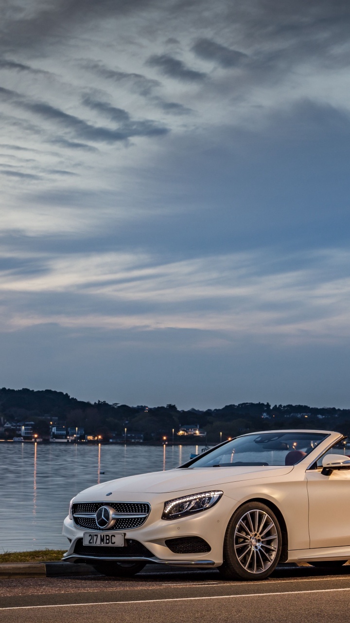 White Mercedes Benz Coupe Parked Near Body of Water During Daytime. Wallpaper in 720x1280 Resolution