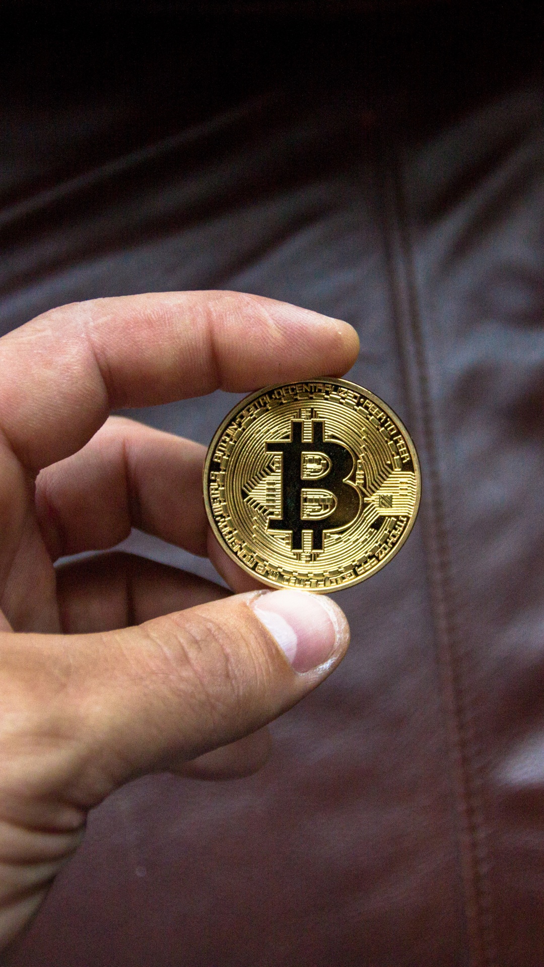 Gold Round Coin on Brown Leather Textile. Wallpaper in 1080x1920 Resolution