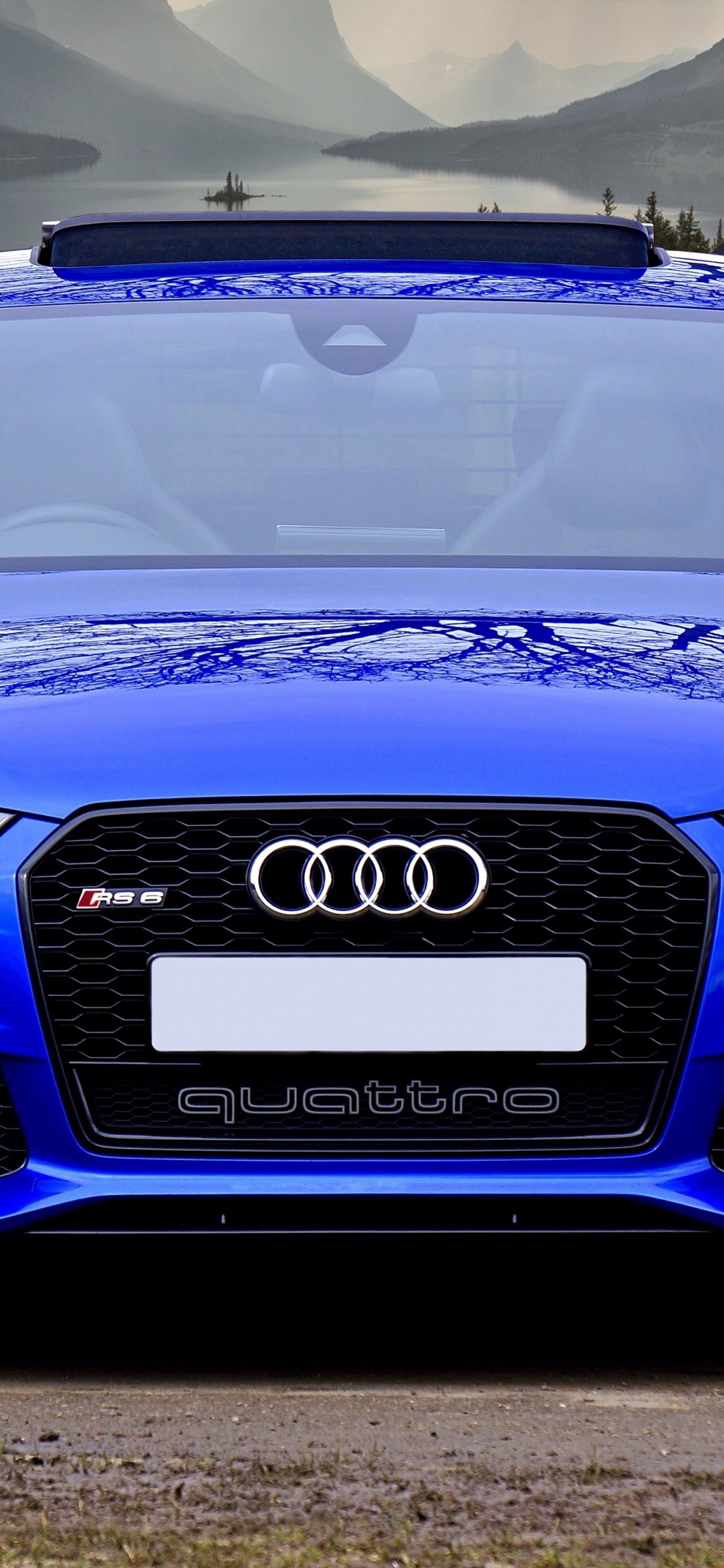 Bleu Audi a 4 Sur Route Pendant la Journée. Wallpaper in 1242x2688 Resolution