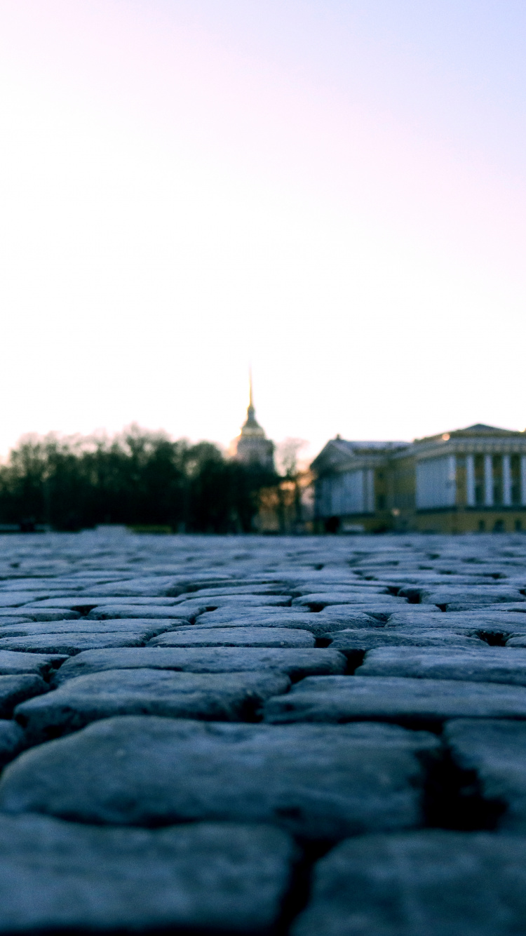 Gray Concrete Road During Daytime. Wallpaper in 750x1334 Resolution