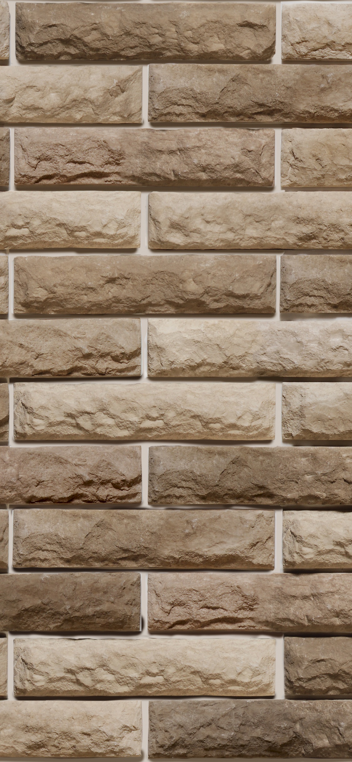 Brown Brick Wall During Daytime. Wallpaper in 1125x2436 Resolution