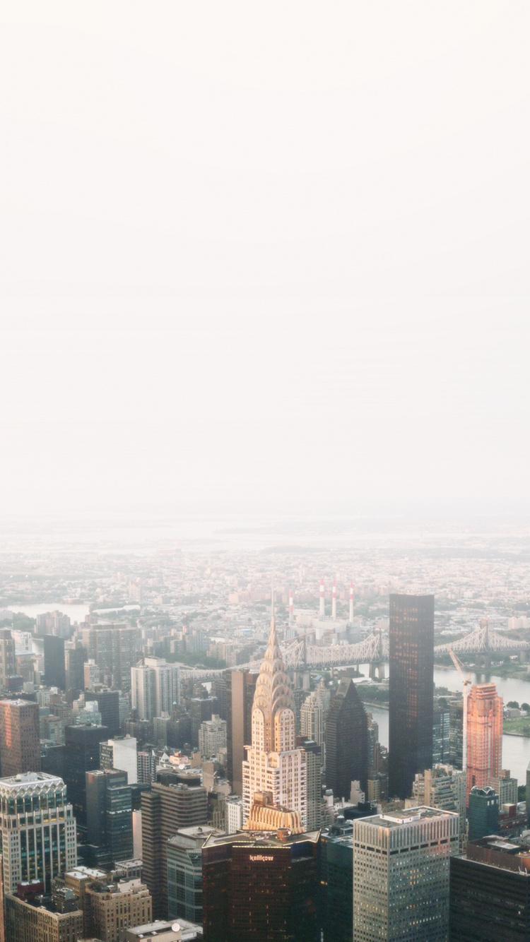 Luftaufnahme Von Stadtgebäuden Tagsüber. Wallpaper in 750x1334 Resolution