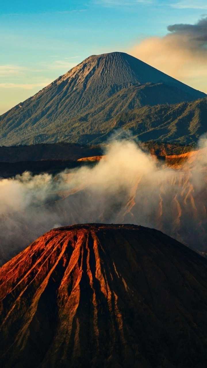 Brown Mountain Under White Clouds During Daytime. Wallpaper in 720x1280 Resolution