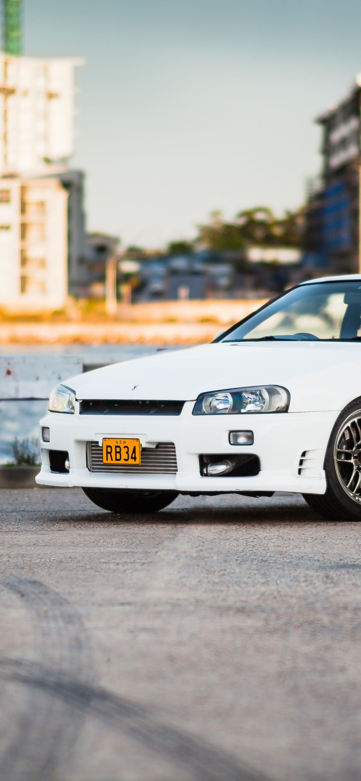 White Bmw m 3 on Road During Daytime. Wallpaper in 1242x2688 Resolution