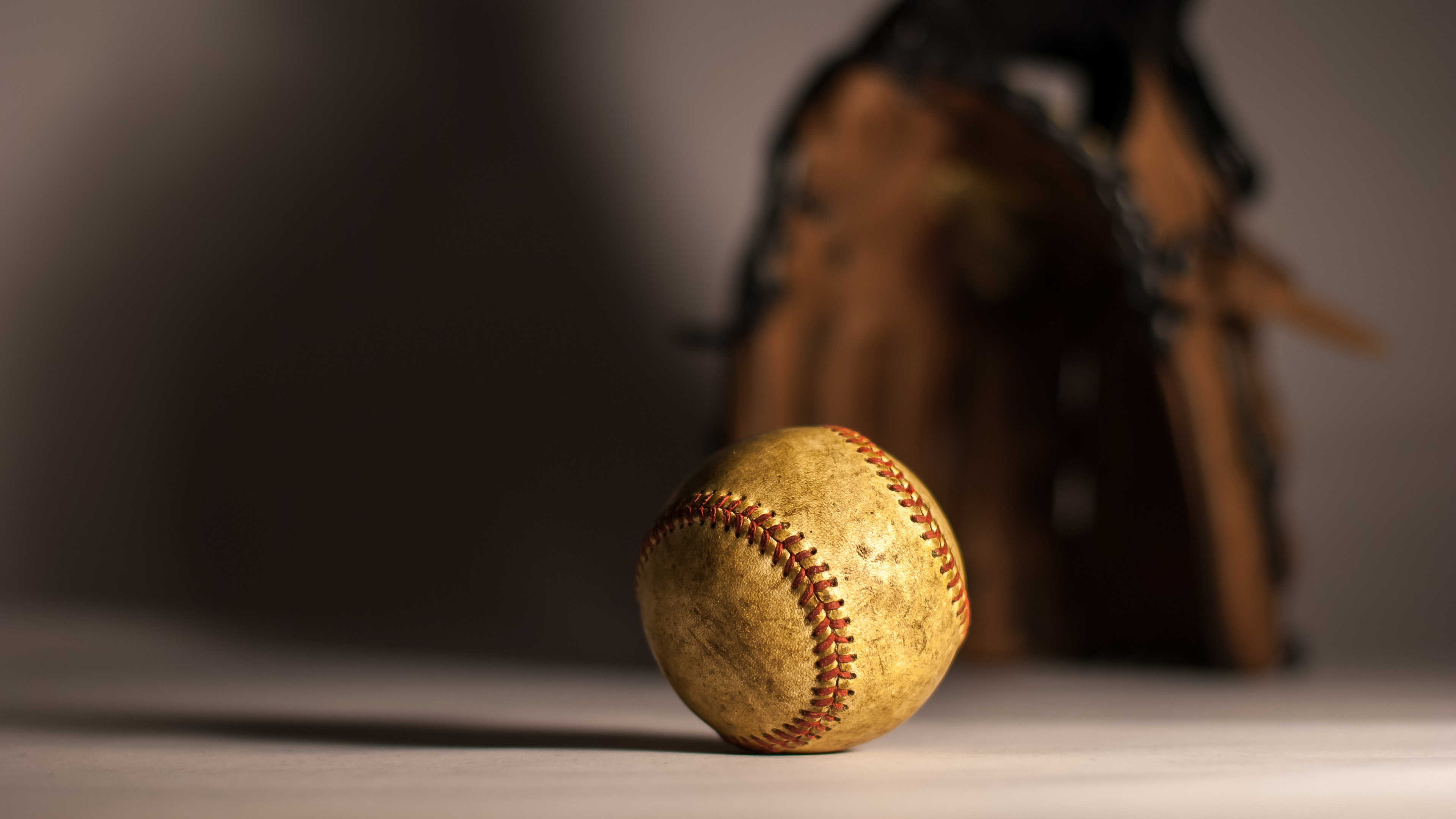 Brown Baseball on Brown Wooden Table. Wallpaper in 3840x2160 Resolution