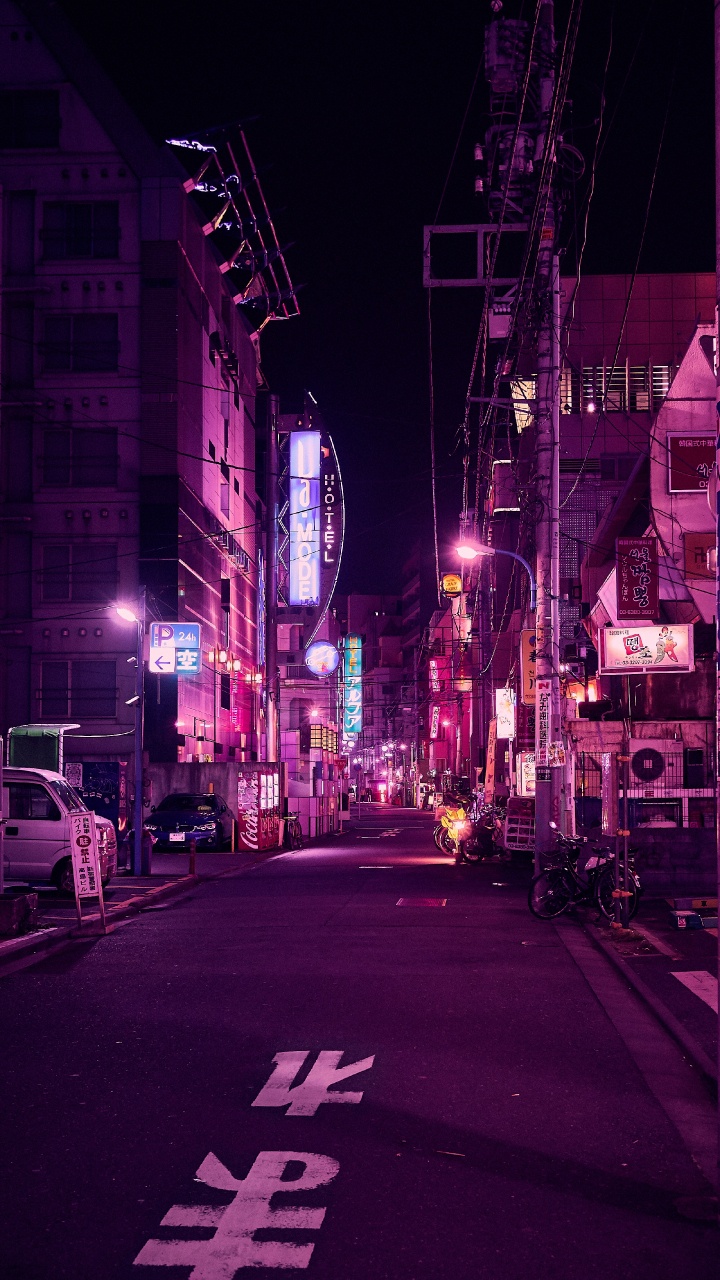 Cars Parked on Side of The Road During Night Time. Wallpaper in 720x1280 Resolution