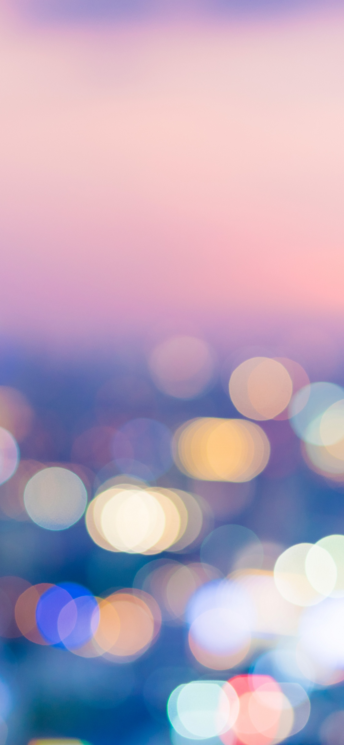 Blaue Und Weiße Bokeh-Lichter. Wallpaper in 1125x2436 Resolution