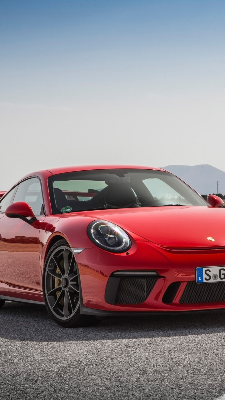 Roter Bmw m 3 Tagsüber Unterwegs. Wallpaper in 720x1280 Resolution