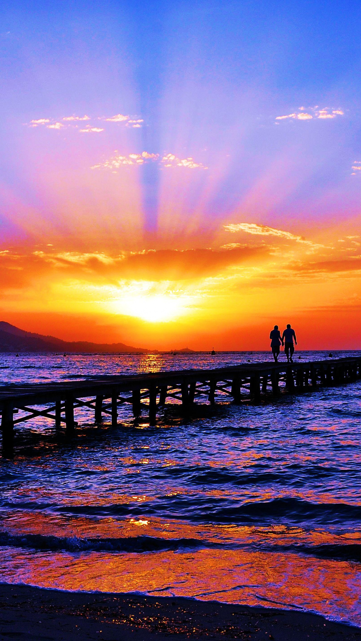 Silhouette of Person Walking on Wooden Dock During Sunset. Wallpaper in 1440x2560 Resolution