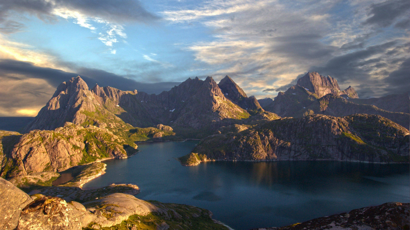 Lake in The Middle of Mountains Under Blue Sky and White Clouds During Daytime. Wallpaper in 1366x768 Resolution