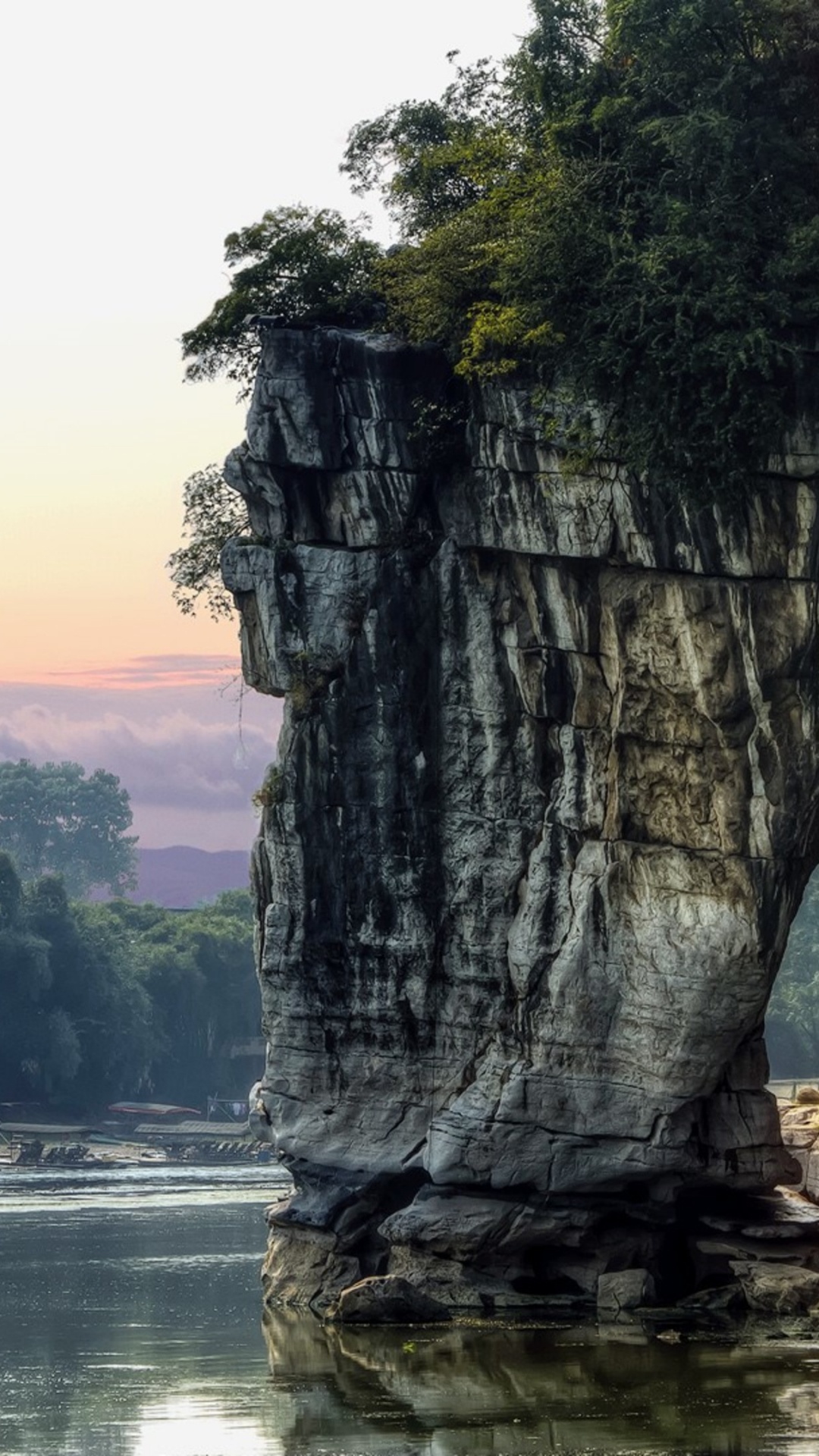 Gray Rock Formation Near Body of Water During Daytime. Wallpaper in 1080x1920 Resolution