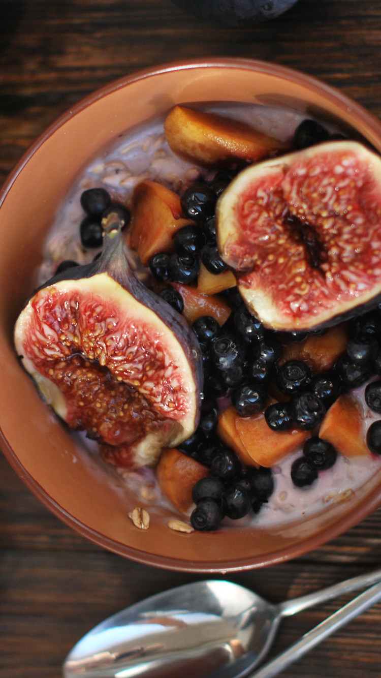 Sliced Fruit on Brown Ceramic Bowl. Wallpaper in 750x1334 Resolution