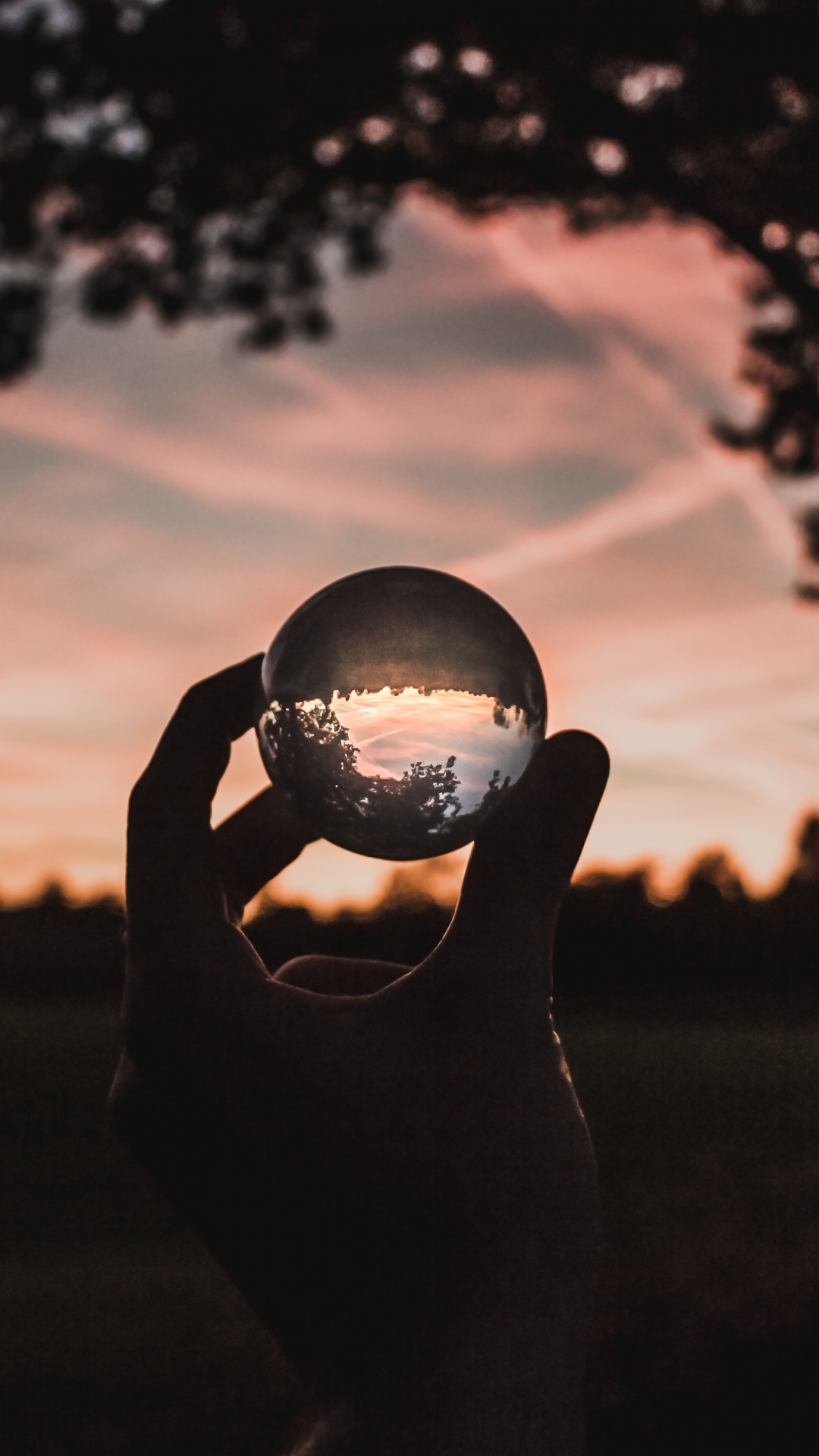 Silhouette of Person Holding Ball During Sunset. Wallpaper in 1080x1920 Resolution