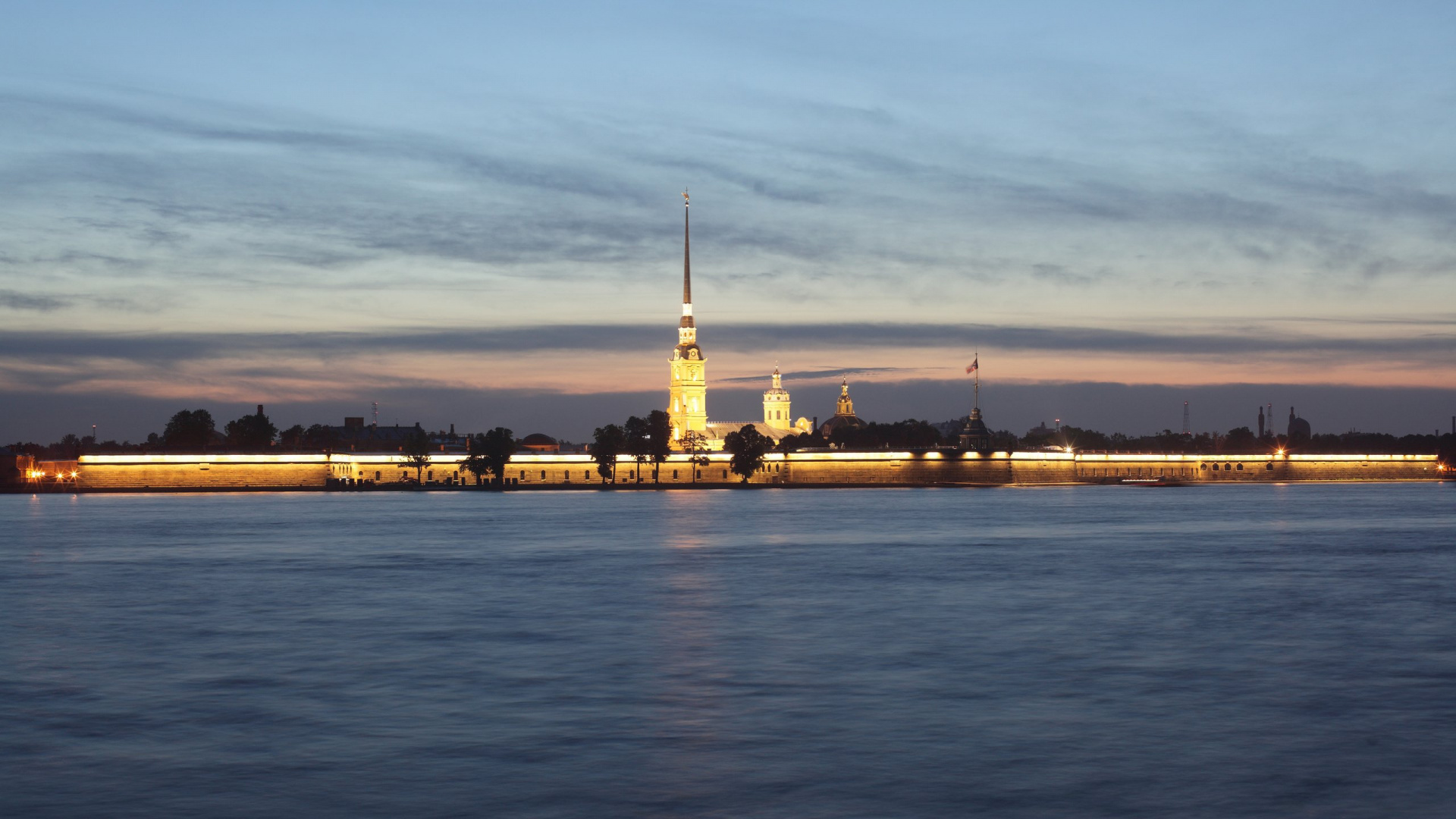 White and Brown Concrete Building Near Body of Water During Daytime. Wallpaper in 1920x1080 Resolution